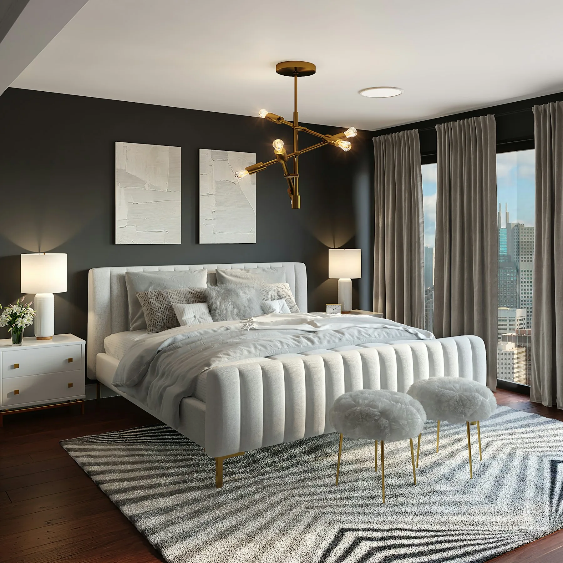 Well-made bed with layered white pillows and bed linen